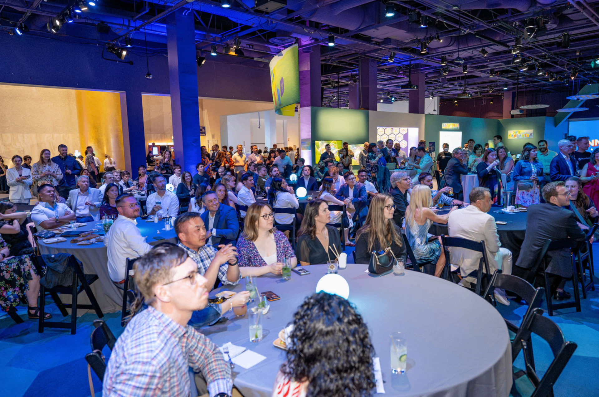 A packed room during a hosted evening